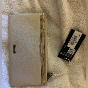 The Sak slim wallet. Cream and Metallic gold. Brand new with tags